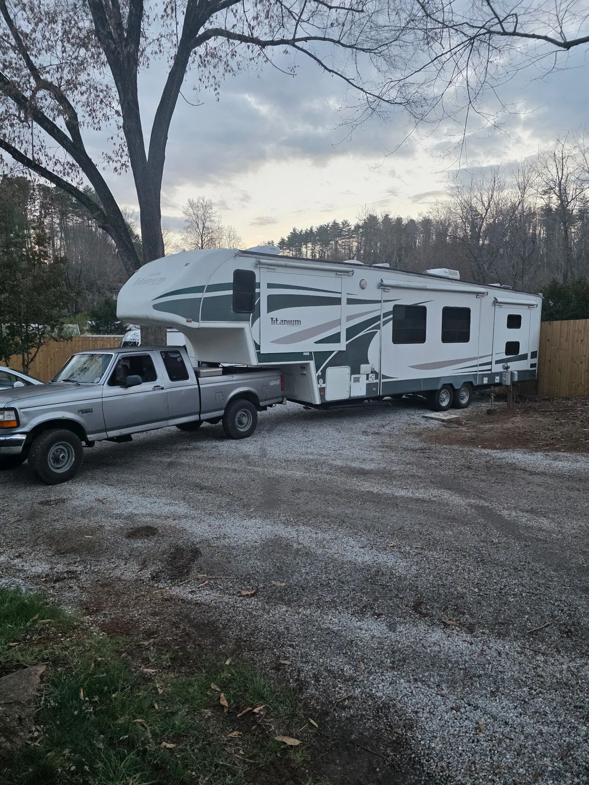 Mission RV technician setting up to service an RV leveling system
